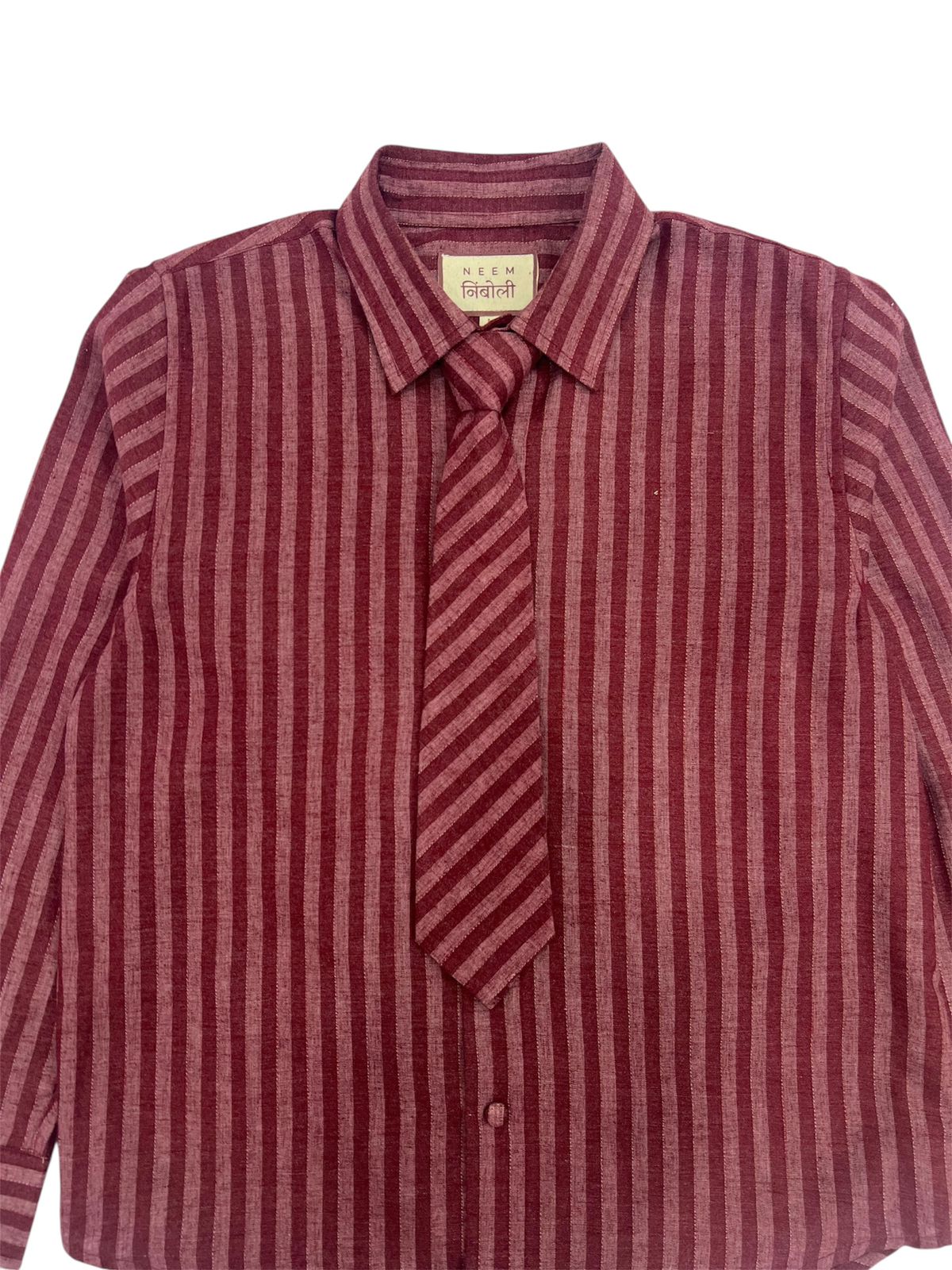 Red and white striped shirt with a tie on a white background